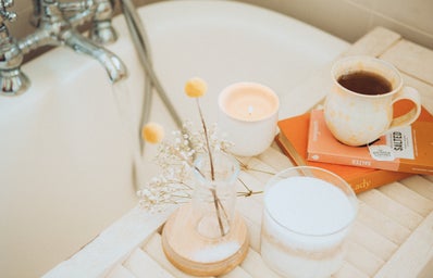 Coffee cup near bathtub