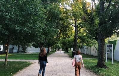 girls walking down a path