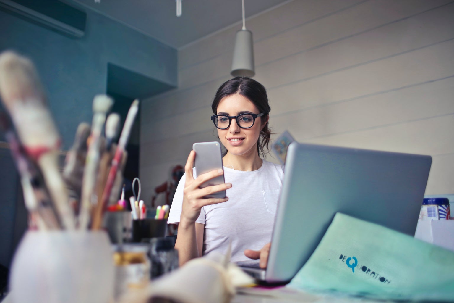 Woman in white shirt working