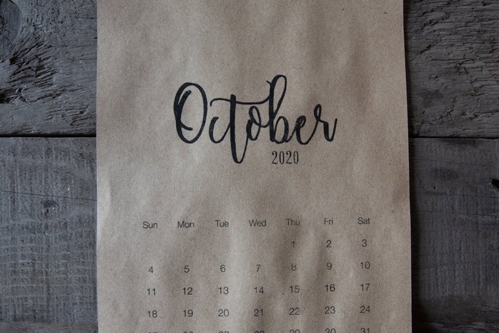 October Calendar On Wooden Surface