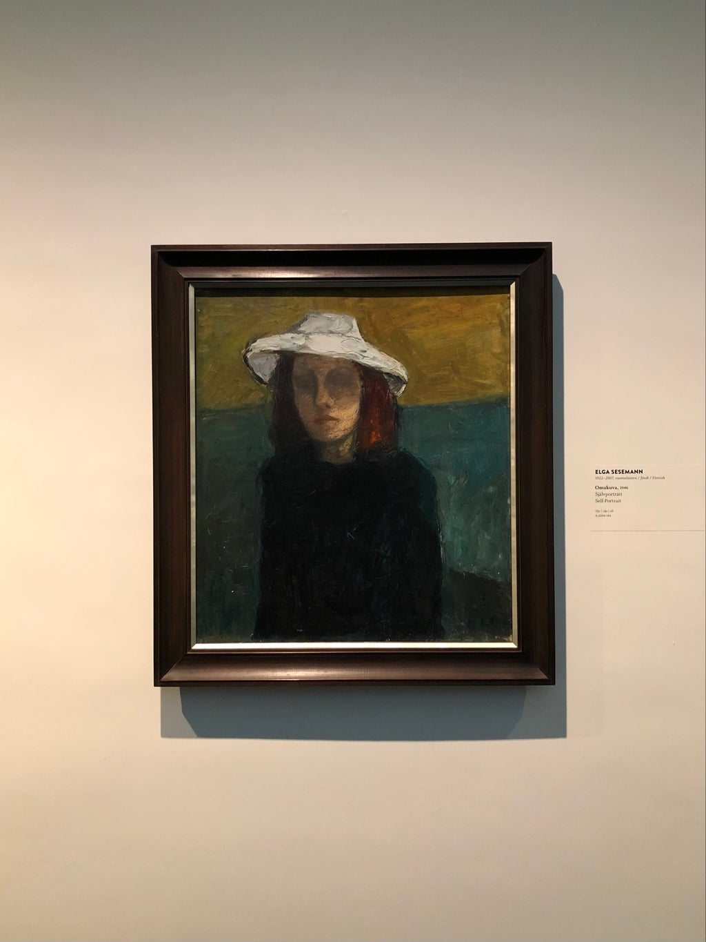 A portrait painting of the artist herself. A young woman with white hat.