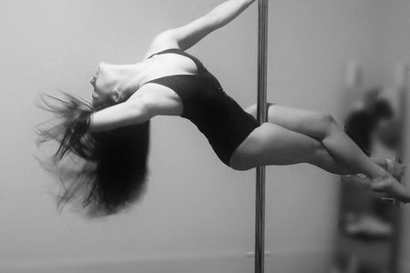Pole Dance Sit with Hair Whip