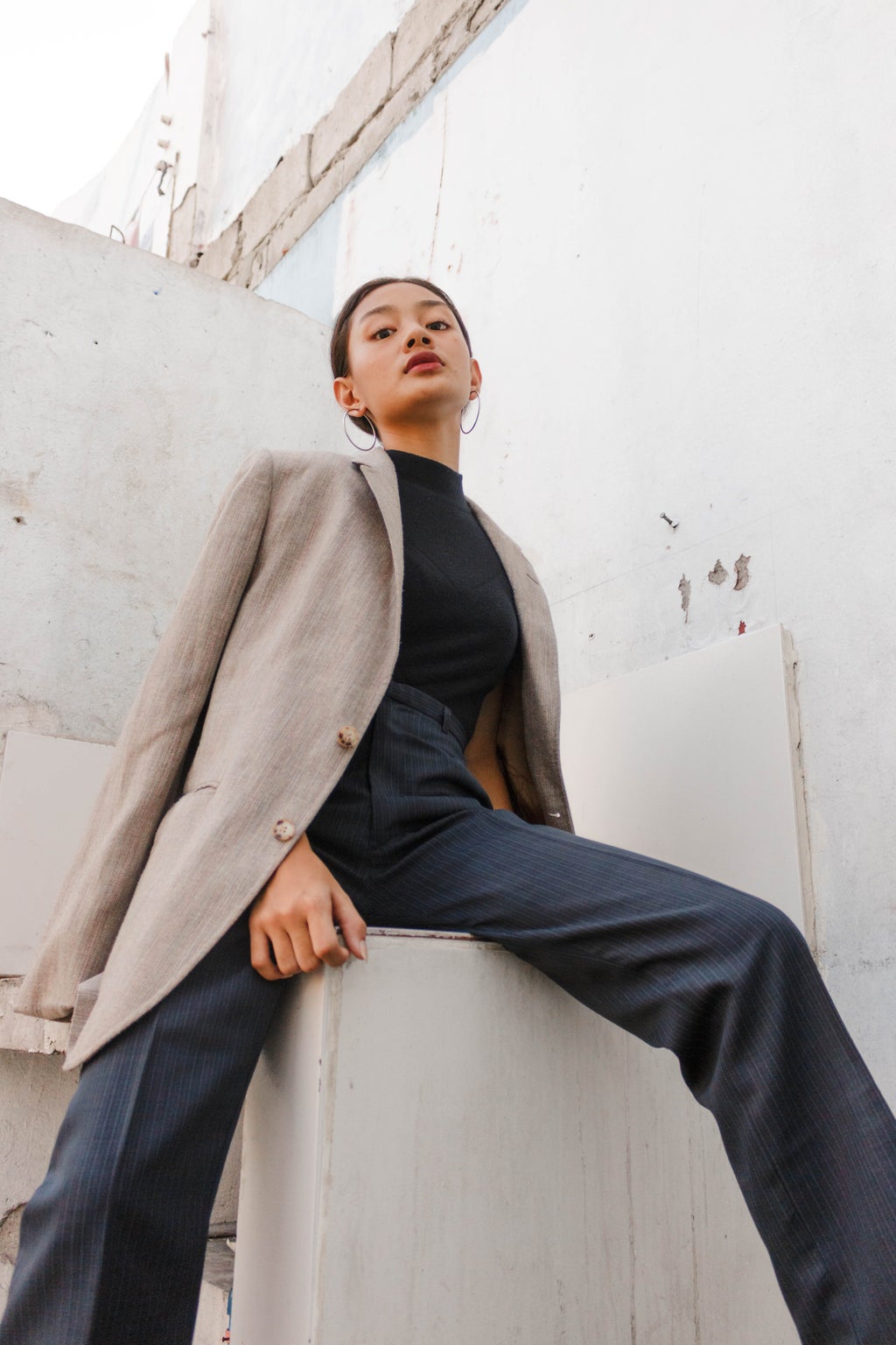 woman wearing suit and button up fall fashion