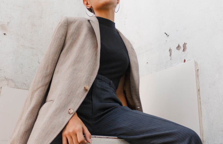 woman wearing suit and button up fall fashion