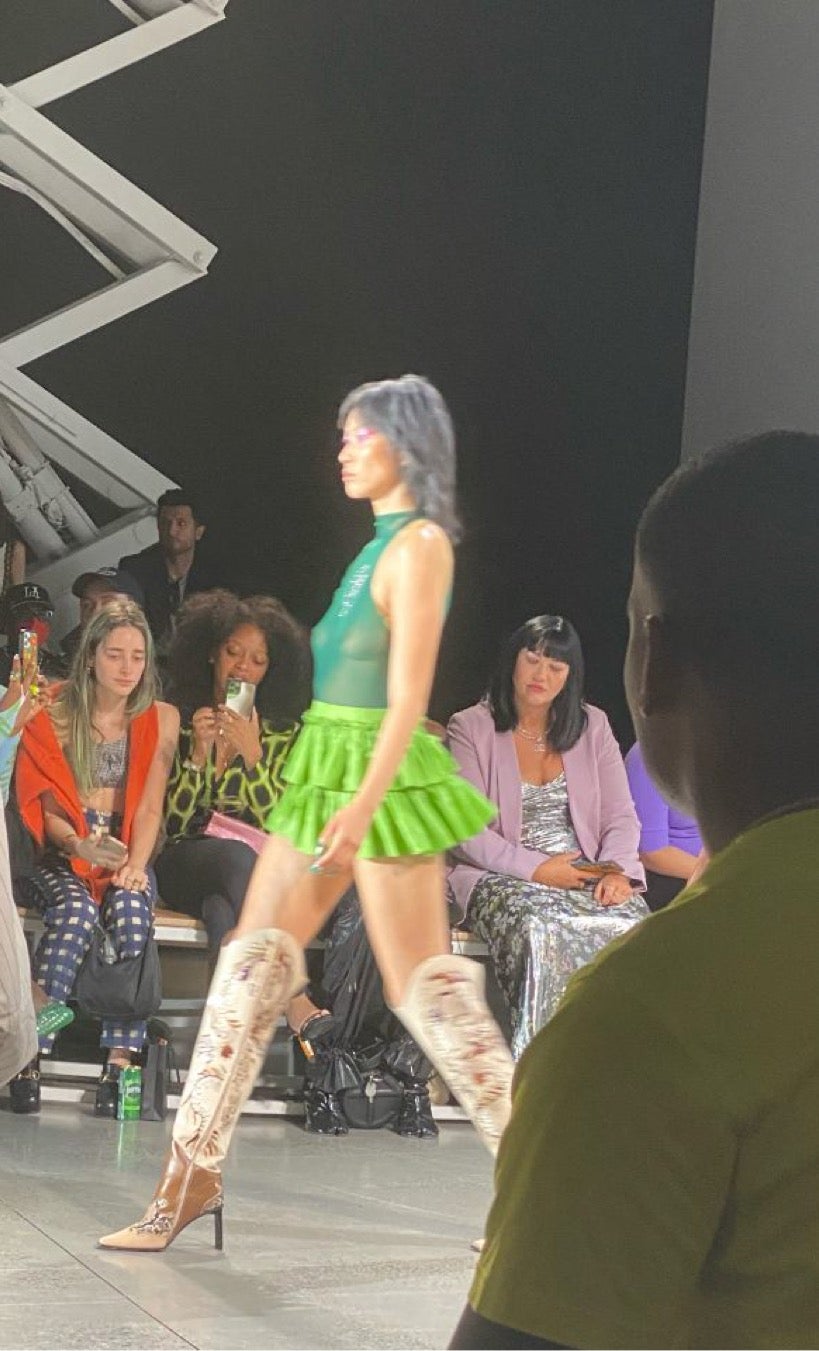 Model at New York Fashion Week 2021 walks the catwalk in Kim Shui garments