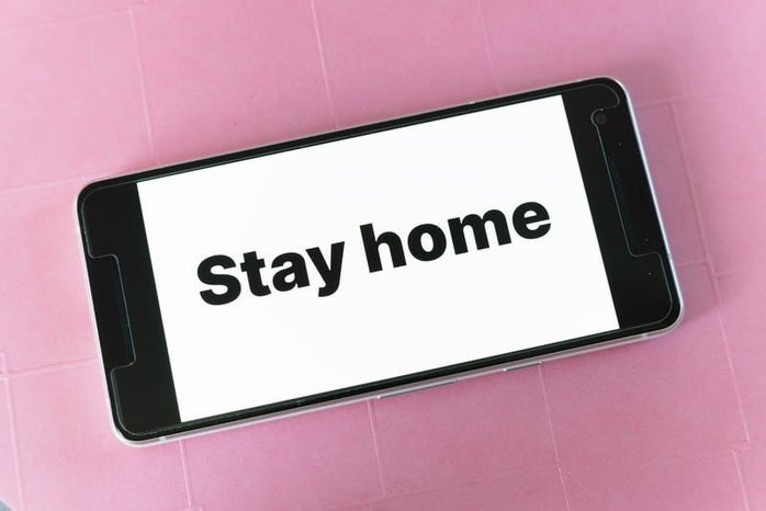 a phone that says stay home