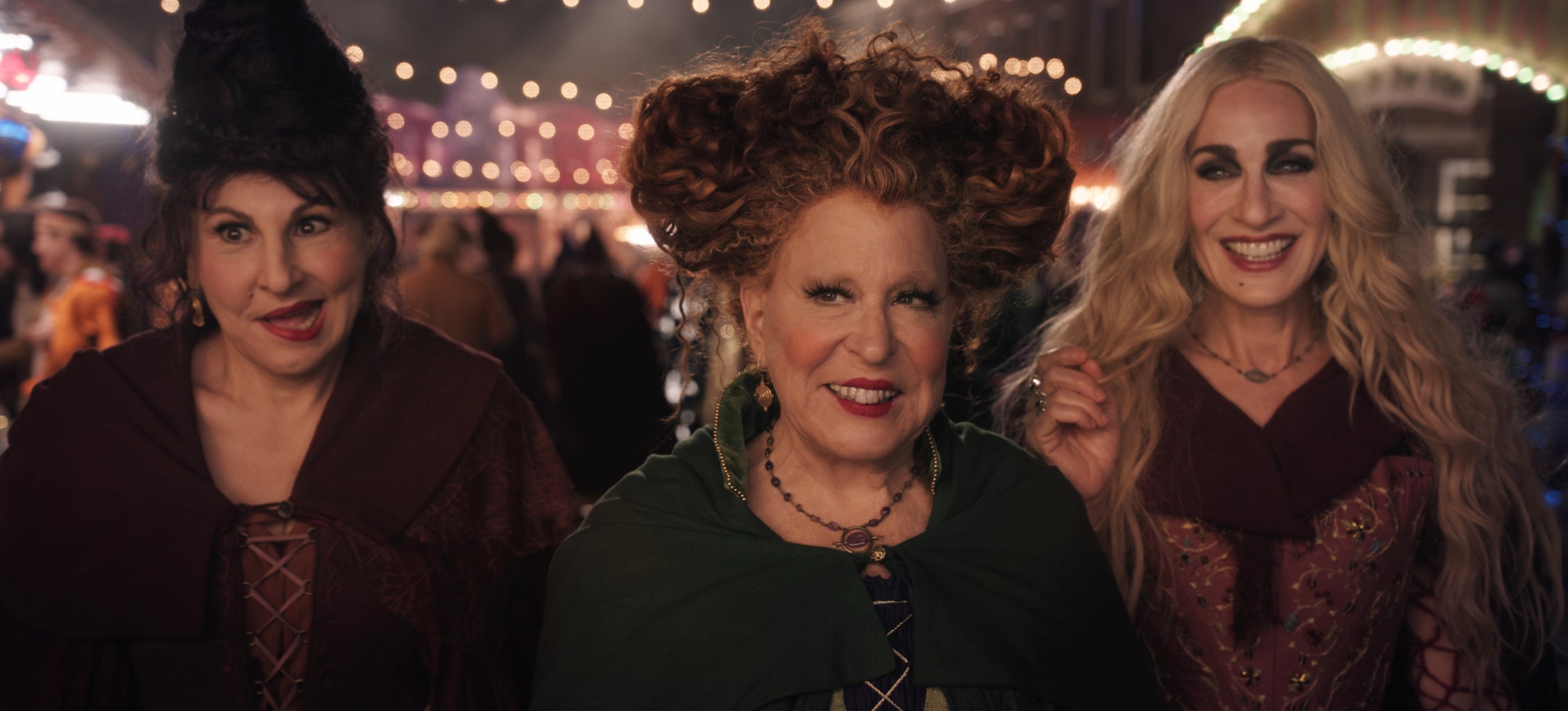 Kathy Najimy as Mary Sanderson, Bette Midler as Winifred Sanderson, and Sarah Jessica Parker as Sarah Sanderson in Disney\'s live-action HOCUS POCUS 2