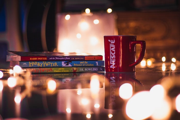 book and candles by Unsplash?width=698&height=466&fit=crop&auto=webp