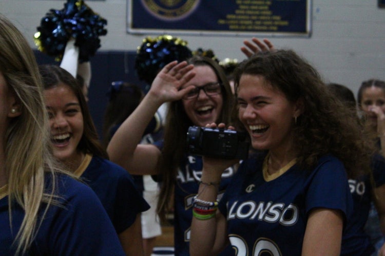 Girls laughing with camera