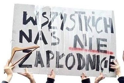 Picture of a sign designed by Dominika Komender used at a protest in Poland in 2016 which reads (in translation): 'You can't knock us all up'