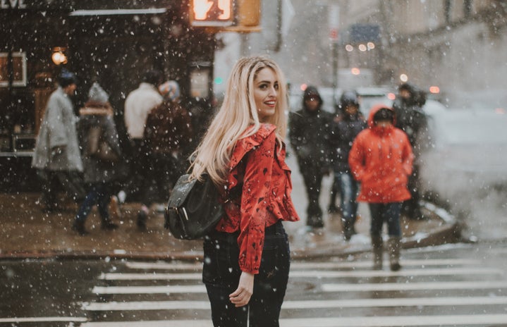 woman walking across the street in the snow by Rodolfo Sanches Carvalho on Unsplash?width=719&height=464&fit=crop&auto=webp