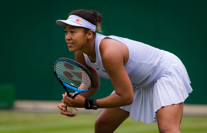 Naomi Osaka of Japan in action during her first-round match at the 2019 Nature Valley Classic WTA Premier tennis tournament