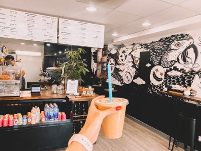 coffee bar with iced coffee in the foreground