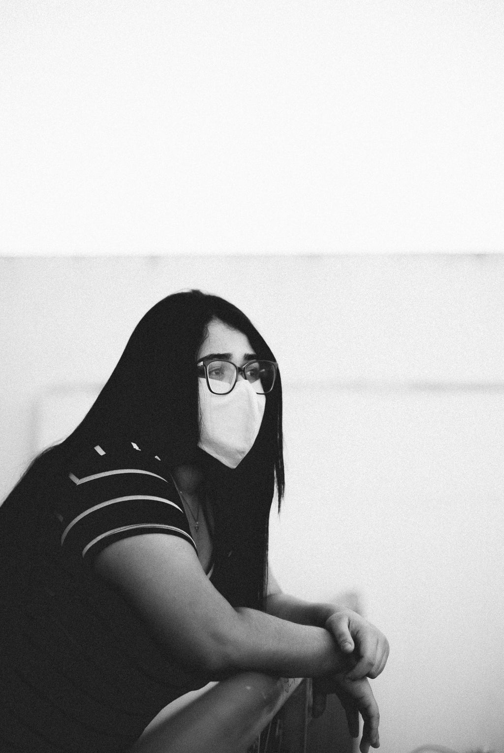 Girl wearing mask and glasses
