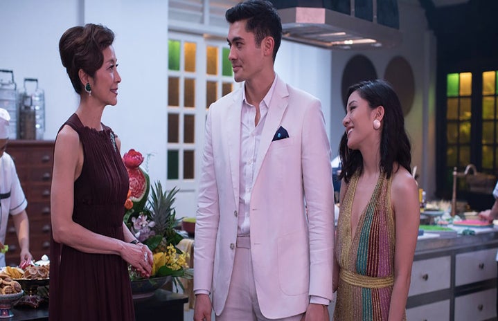 michelle yeon, henry golding and constance wu stand in kitchen in \'crazy rich asians\'