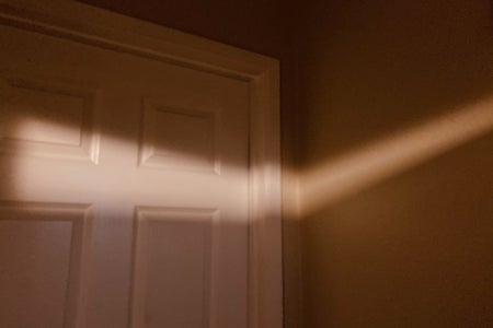 Photo of corner of hall with sunlight peeking through