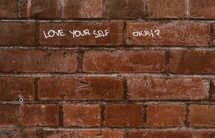 Love yourself written on wall by Nicole De Khors?width=719&height=464&fit=crop&auto=webp