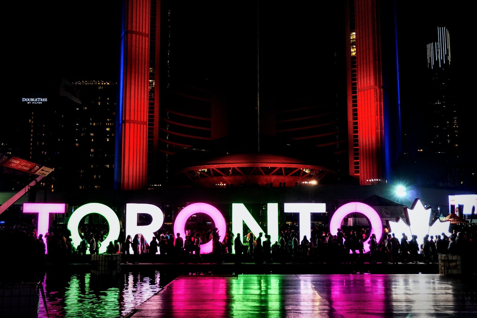 Nathan Phillips Square in Toronto, Canada at nighttime
