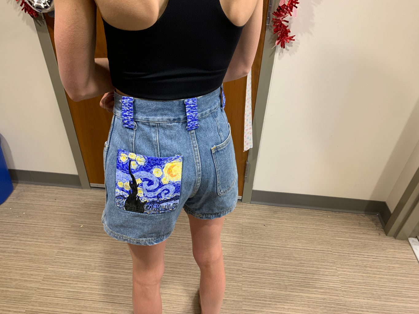 denim shorts painted with starry night on pocket