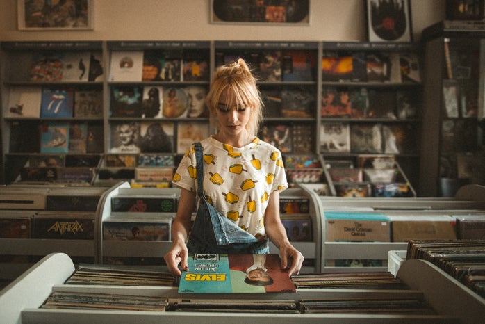 woman in record store by Jamakassi?width=698&height=466&fit=crop&auto=webp