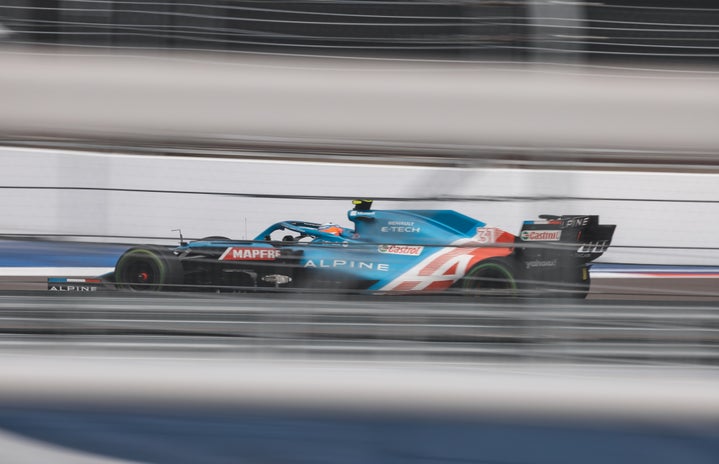 formula 1 car with \"Alpine\" on the side