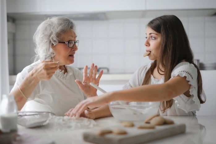Grandma baking with granddaughter