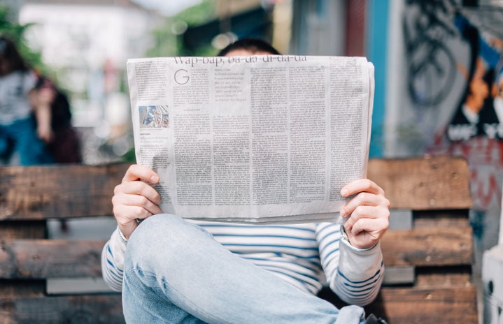 person reading the newspaper by Roman Kraft on Unsplash?width=719&height=464&fit=crop&auto=webp