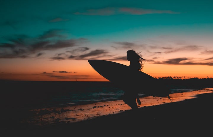 woman surfing at sunset by Rafael Leo on Unsplash?width=719&height=464&fit=crop&auto=webp