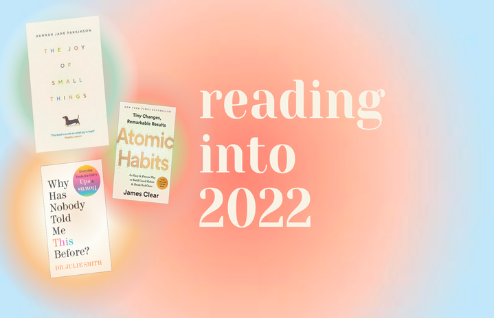 Rainbow background with book covers and text that says \"reading into 2022\"