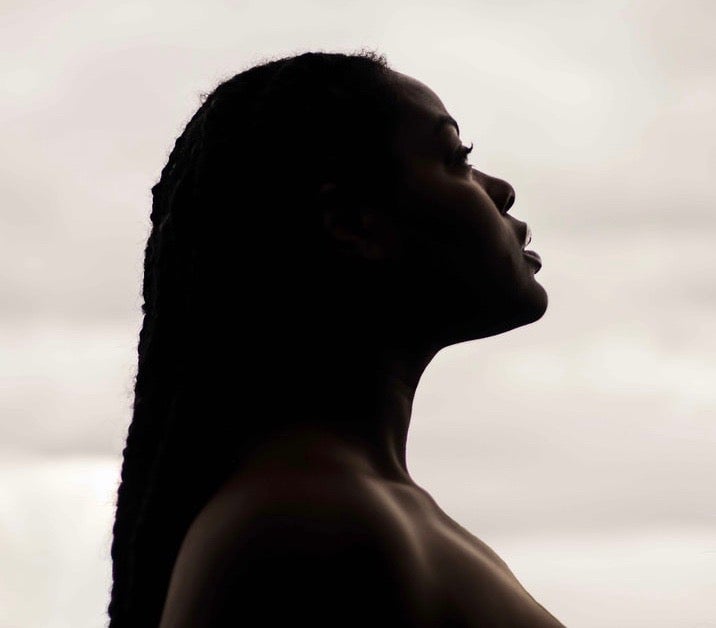 Black woman looking to the sky