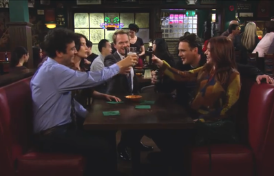 How I Met Your Mother characters raising glasses in a bar