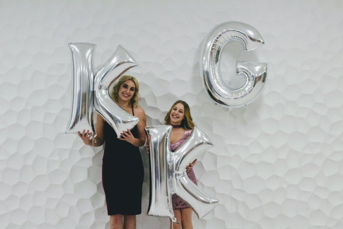 two women holding KKG balloons by Erin Murray?width=698&height=466&fit=crop&auto=webp