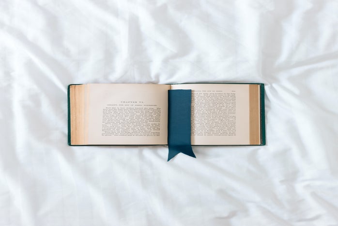 open book on bed by Erol Ahmed on Unsplash?width=698&height=466&fit=crop&auto=webp