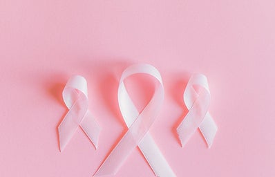 Three pink breast cancer awareness ribbons