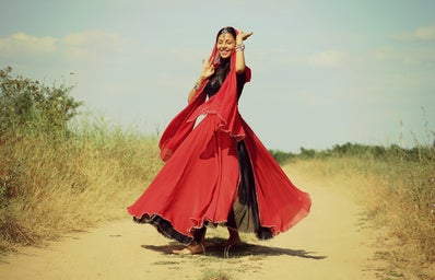 Indian girl dancing in traditional outfit