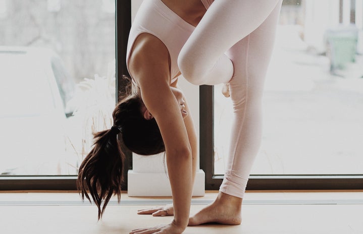 Woman doing yoga by Mathilde Langevin from Unsplash?width=719&height=464&fit=crop&auto=webp