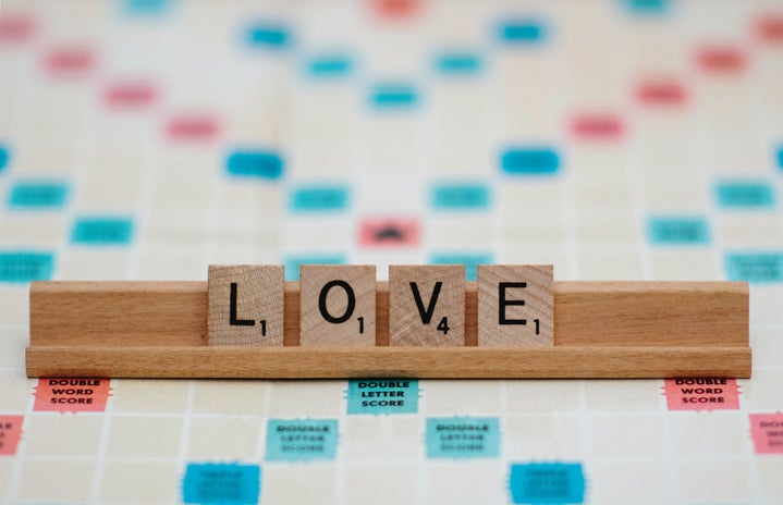 Scrabble tiles that spell out love