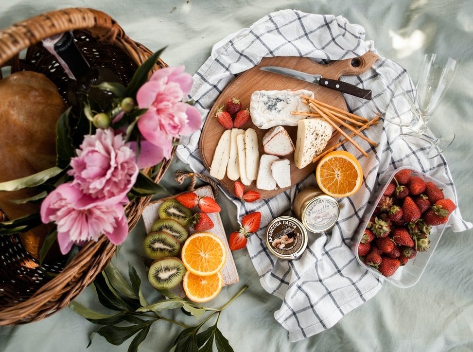 charcuterie board with fruit and cheese