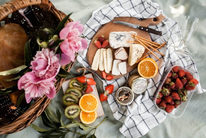 charcuterie board with fruit and cheese by Unsplash?width=698&height=466&fit=crop&auto=webp