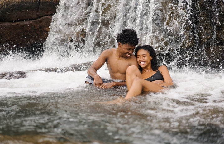 couple smiling in waterfall by Briona Baker?width=719&height=464&fit=crop&auto=webp