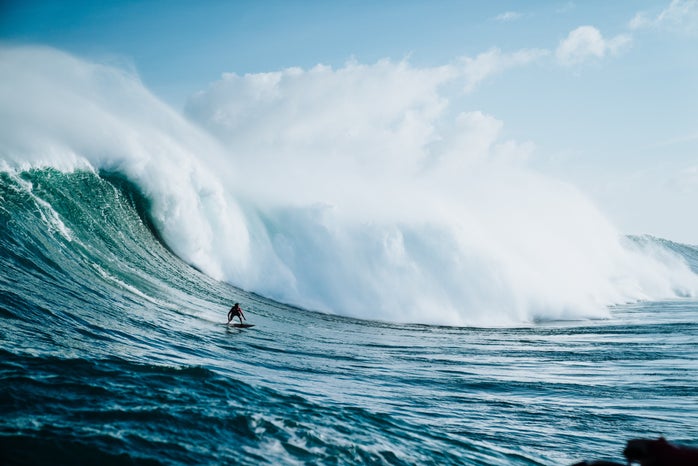 surfing big wave by guille pozzi on Unsplash?width=698&height=466&fit=crop&auto=webp