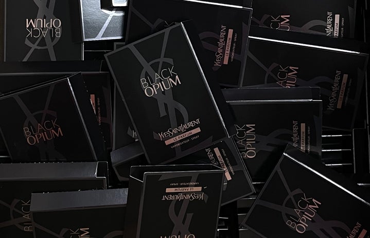 Photo of samples of Yves Saint Laurent\'s Black Opium perfume we received through a Her Campus partnership