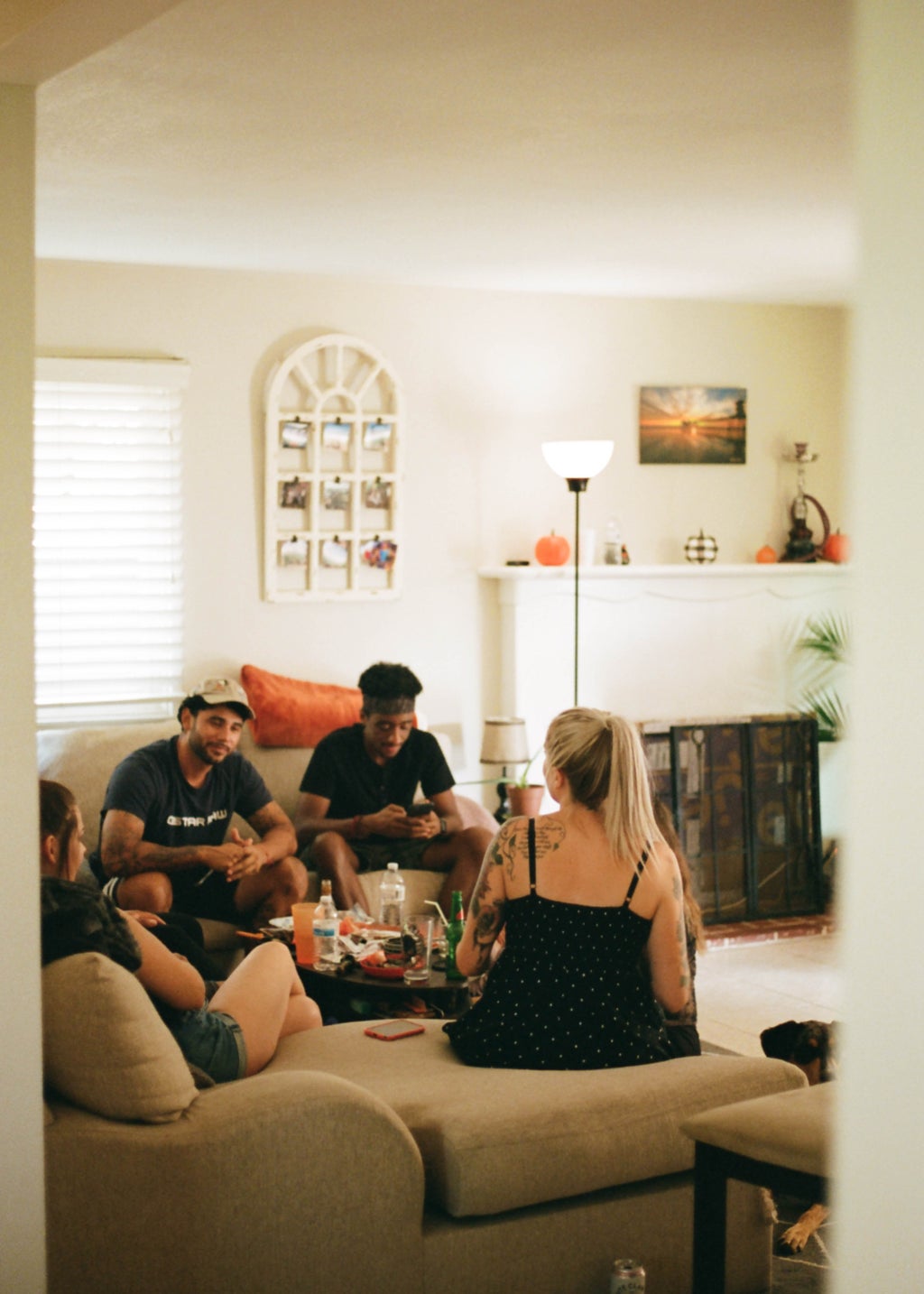 Group of people sitting in livingroom
