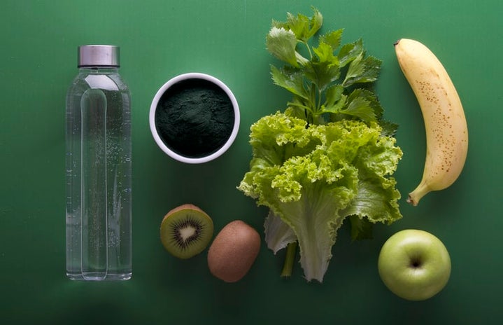 Flatlay of food on green background