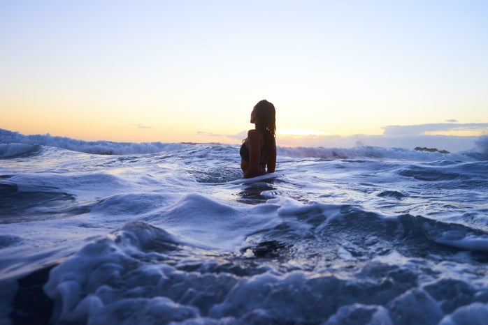 Woman in the ocean by Yoann Boyer via Unsplash?width=698&height=466&fit=crop&auto=webp