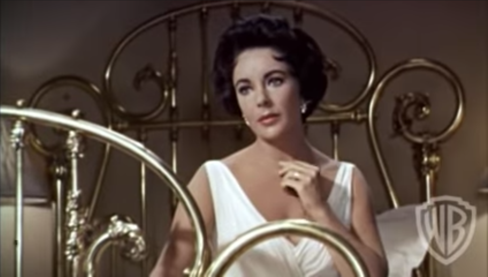 screenshot of Elizabeth Taylor from Cat on a Hot Tin Roof movie trailer on YouTube from Warner Bros.
