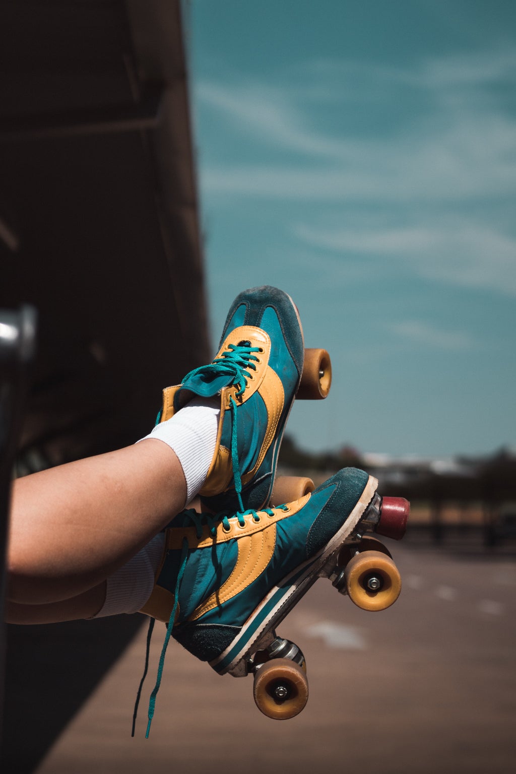 close up shot of a person wearing roller skates