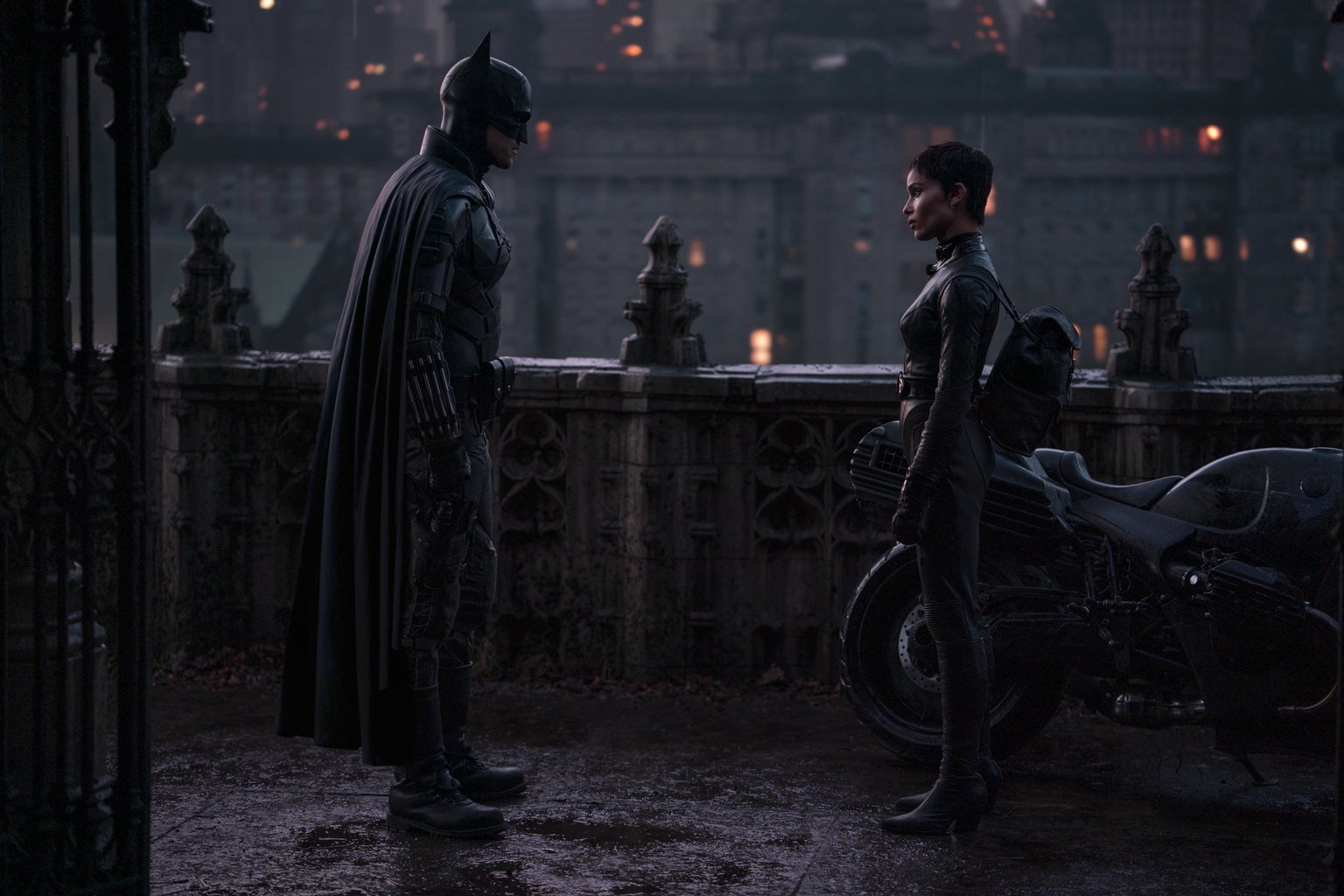 ROBERT PATTINSON as Batman and ZOË KRAVITZ as Selina Kyle in “THE BATMAN”