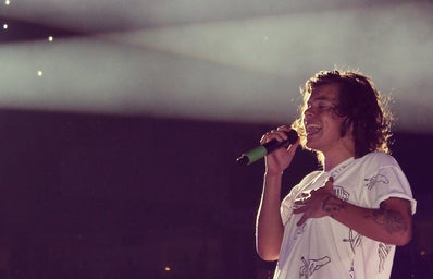 Harry styles singing at concert