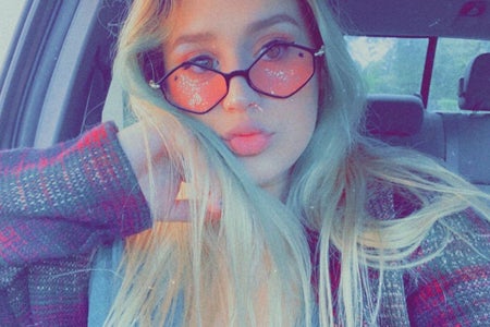 Selfie of girl in red glasses